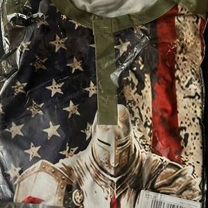 2xl shirt with a warrior and the USA Flag on it fits body well